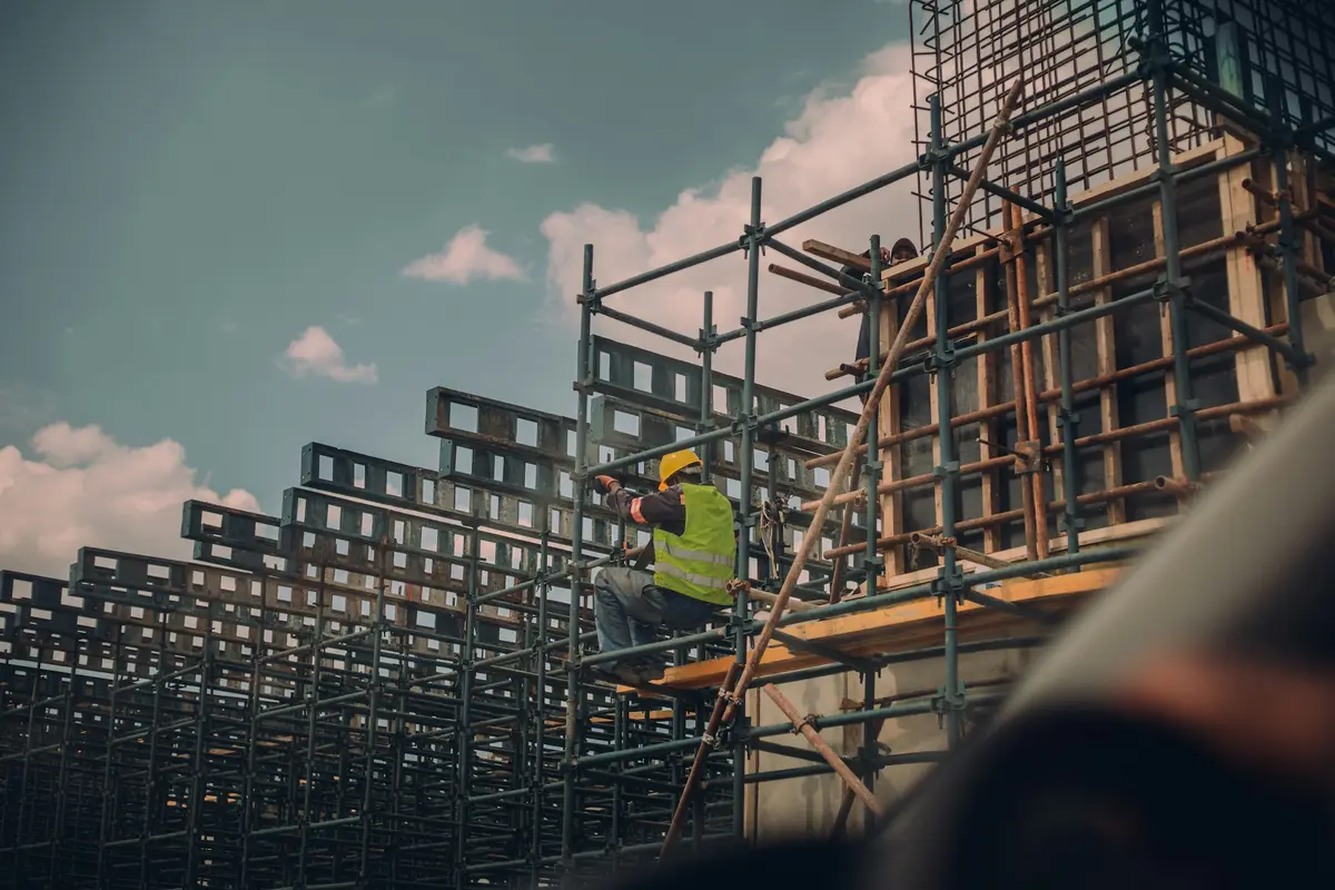 Construction site with scaffolding set up around the working area