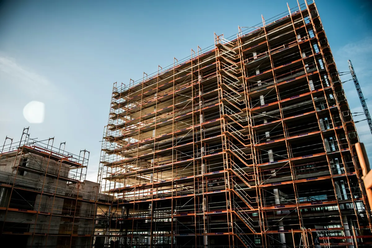 Scaffolding across the façade of a commercial building